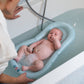 Matelas de bain gonflable doomoo - pour faciliter le bain de bébé à la maison ou en voyage