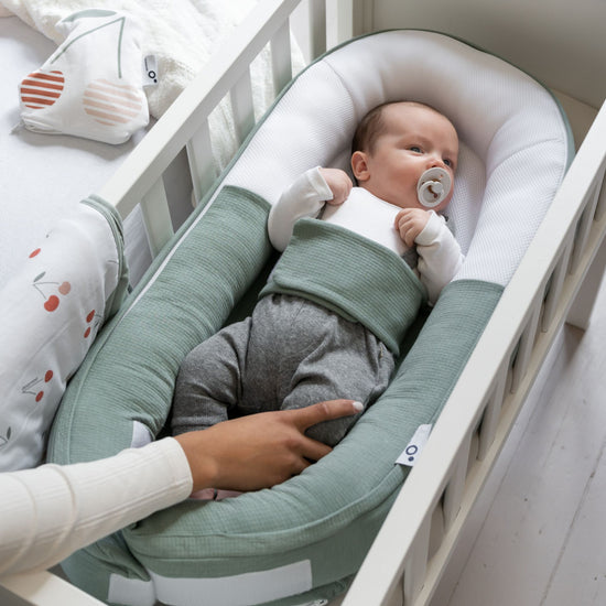 Doomoo cocoon - veilig en knus babynestje - stelt de baby gerust Tetra Jersey Groen